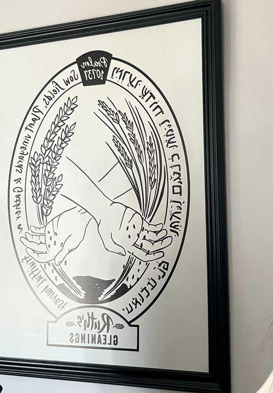 Photo of Ruth's Gleanings logo with hands holding wheat